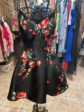 B. Smart Black Mini Dress with Red Floral Print